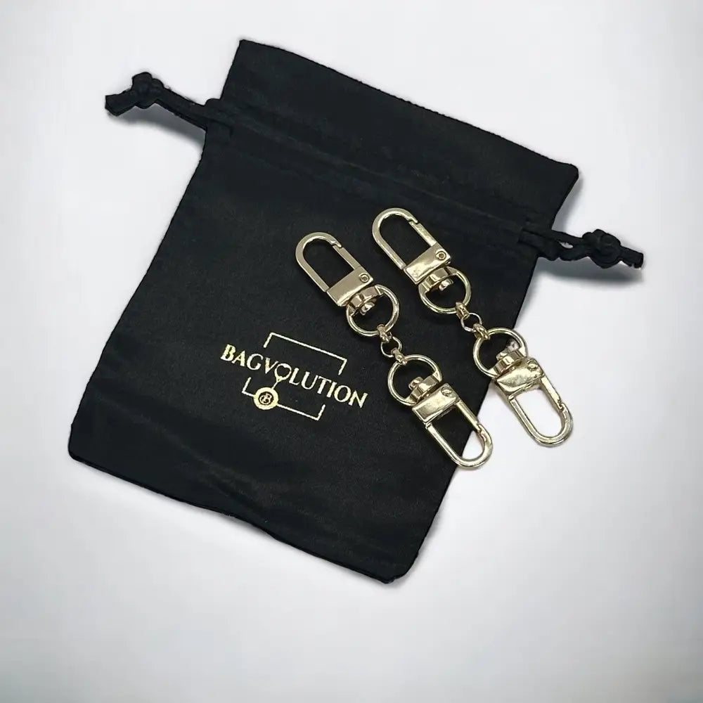 Bagvolution ✧ Clever Gurt Strap Verlängerung ✧ 2er Set Gold Hardware –  Bagvolution - Spezialist für Reinigung & Pflege von Designer Taschen