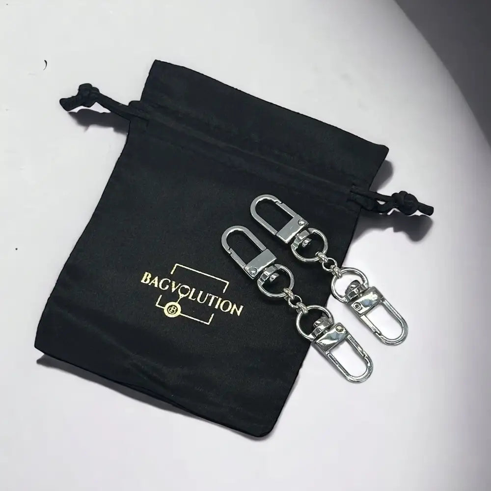 Bagvolution ✧ Clever Gurt Strap Verlängerung ✧ 2er Set Silber Hardware –  Bagvolution - Spezialist für Reinigung & Pflege von Designer Taschen